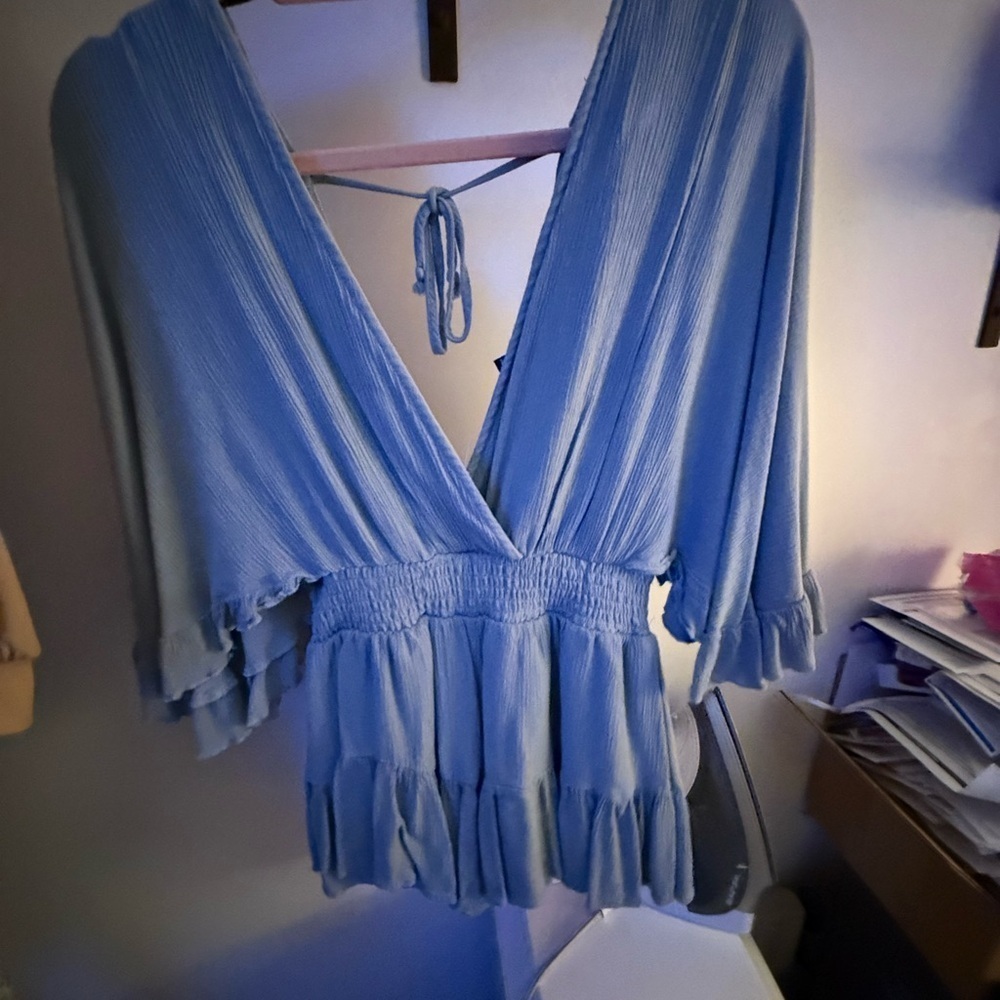 Forever 21 Blue Wrap romper with Tie back and Smocked Ruffles